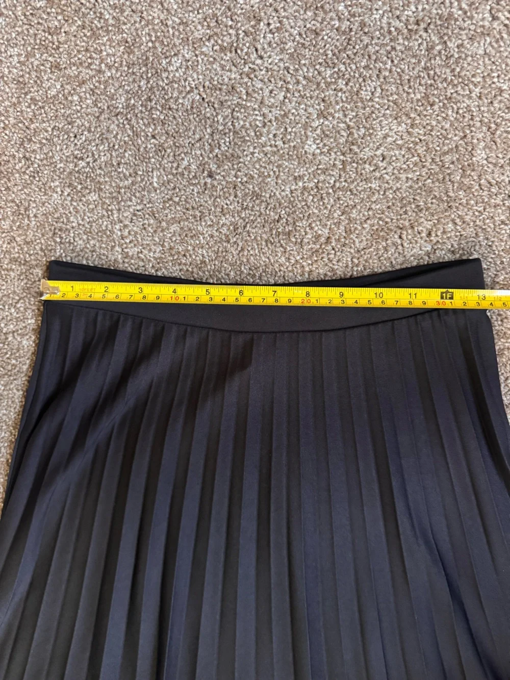 Black pleated midi skirt